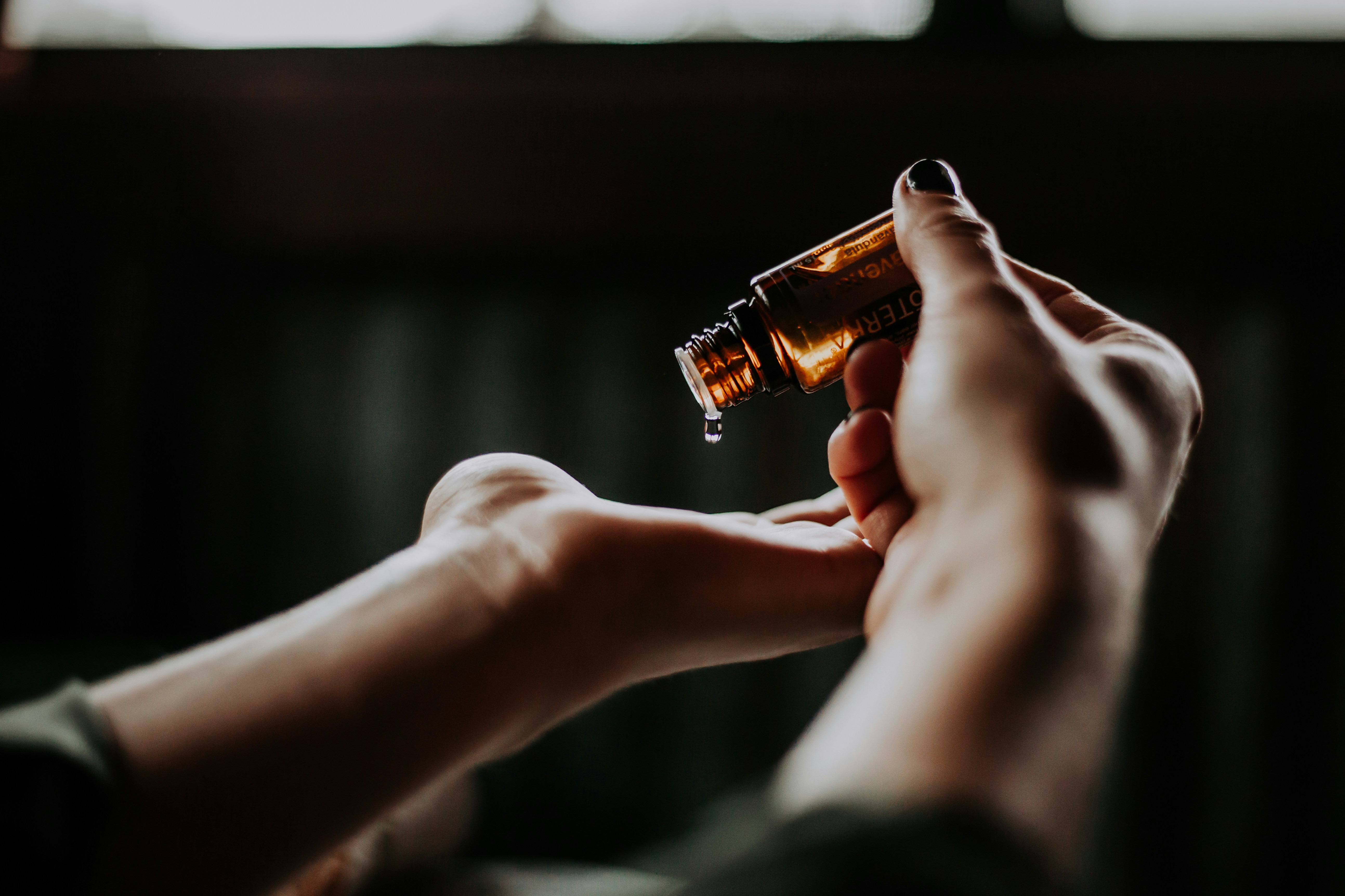 A quiet wellness treatment space in warm, low light